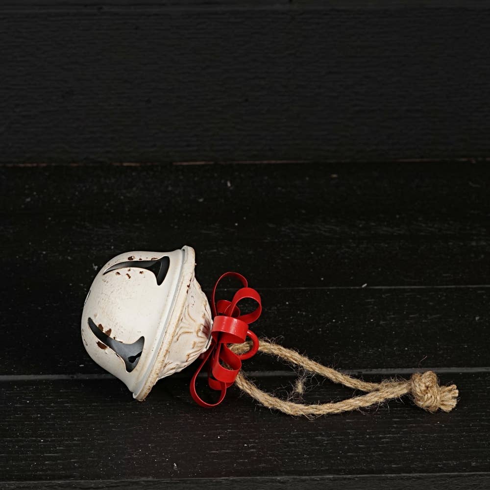 Vintage white bell w/ metal bow 5”