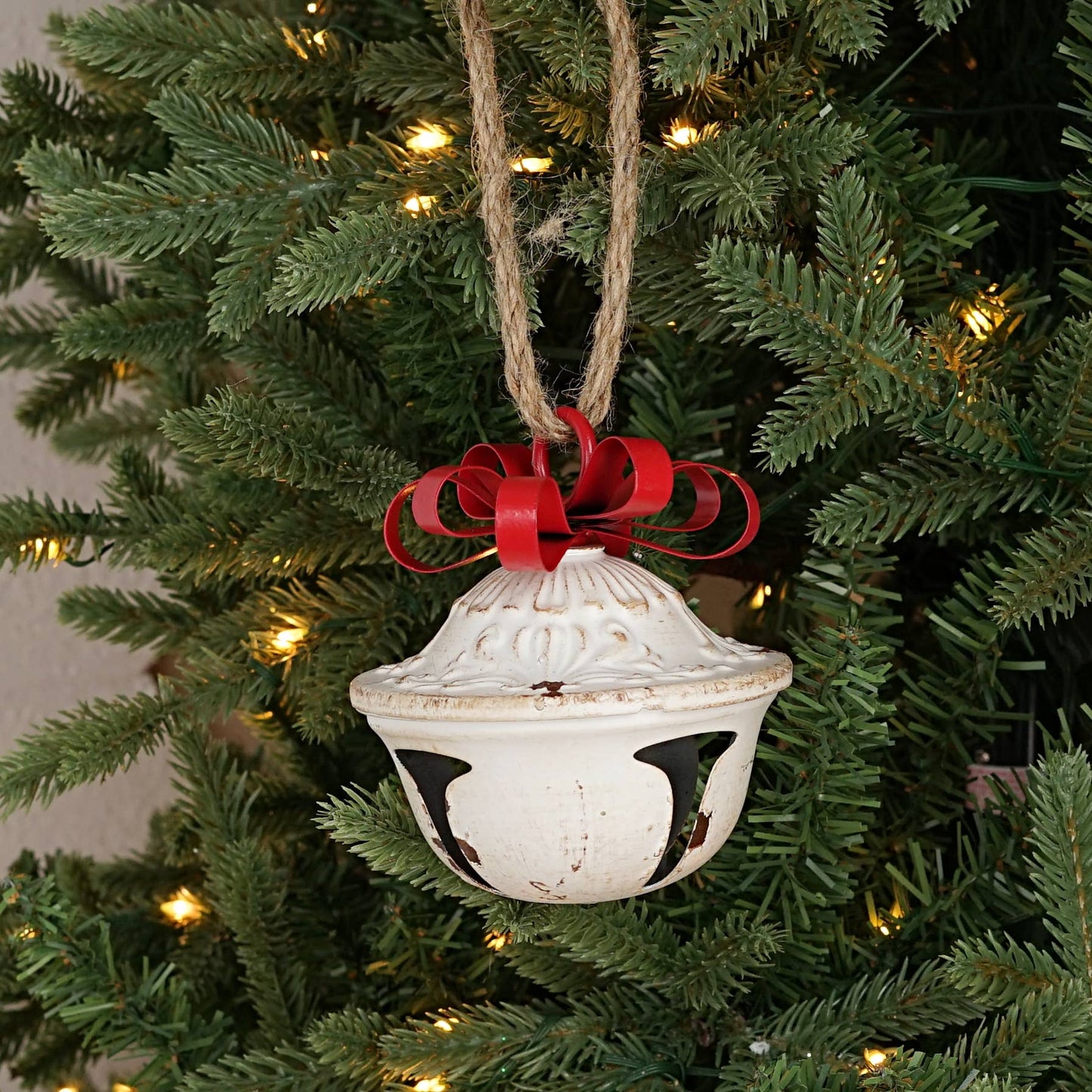 Vintage white bell w/ metal bow 5”