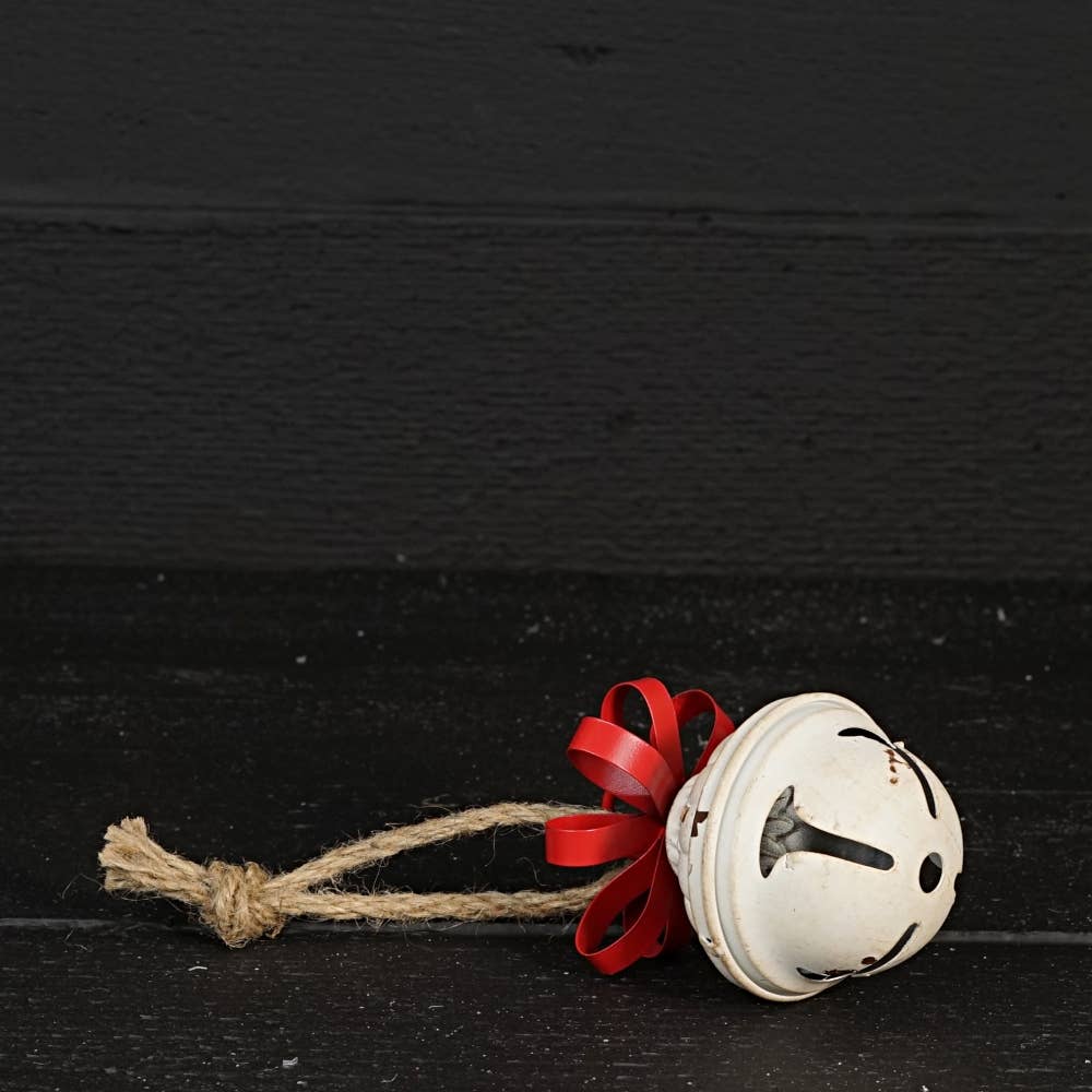 Vintage white bell w/ metal bow 5”